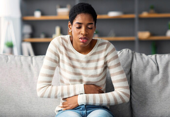 Stomach Ache. Sick Black Female Suffering From Acute Abdominal Pain At Home, Young African Woman...