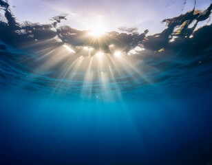 Obraz premium Underwater Sunlight Streaming Through Rippling Water Surface Creating Calm Design