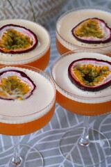 Pornstar Martini cocktails closeup, vibrant tropical cocktail drinks