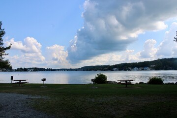 Serene Lake View Under a Dramatic Sky During a Peaceful Afternoon at the Waterfront