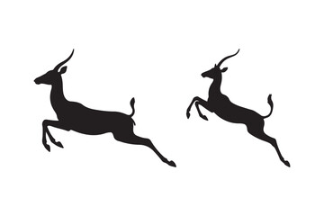 Two black silhouettes of antelopes leaping gracefully
