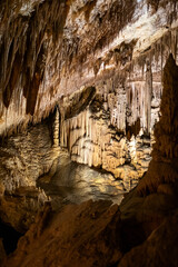Stunning stalactites and stalagmites in mysterious underground cave