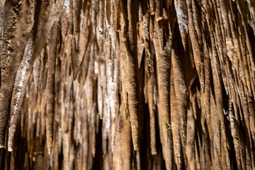 Majestic stalactites in a mysterious cave formation: natural wonders of earth