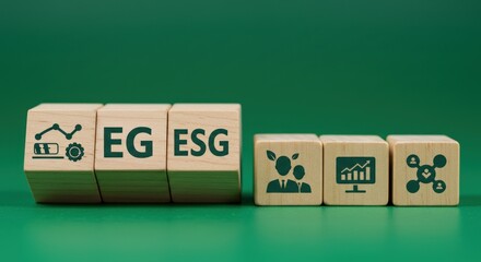 Wooden cubes with EG ESG and ESG icons on a green background