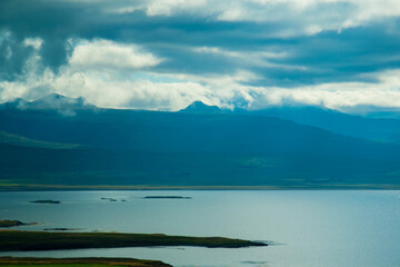 Iceland Ocean Bay with Mountains and Dramatic Clouds