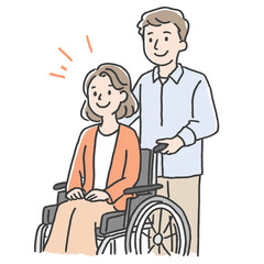 車椅子の女性を介助する男性