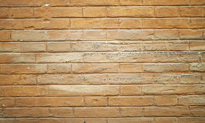 Textured wall background made of bricks. Empty surface backdrop