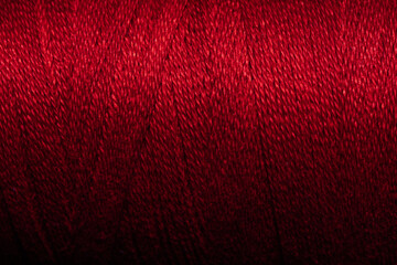 close up of red thread spool