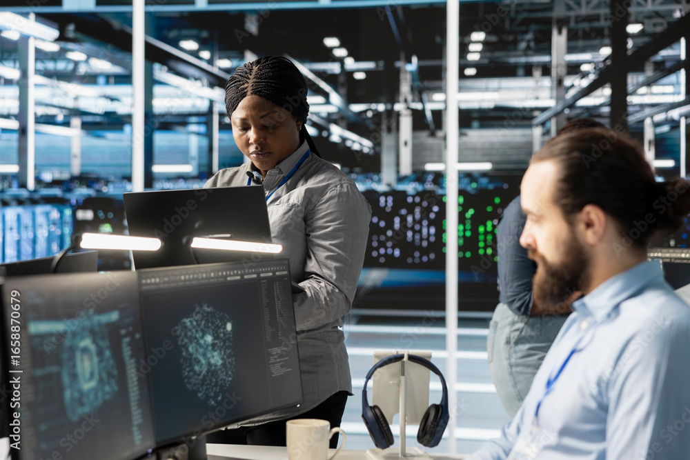 Poster engineers doing maintenance on blade servers supplying compute power for ai data processing and infe