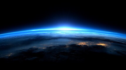 Stunning view of Earth from space, glowing sunrise over darkened continent