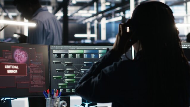 Data center programmer seeing critical error message while using node tree software to analyze datasets. Server room worker receiving glitch popup warning while using visual programming tool, camera B - Powered by Adobe