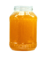 Glass jar of golden bee honey is on a white background. Fine organic product concept. Agriculture and food industry.
