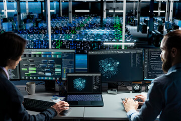 Data center technicians monitoring AI applications, adjusting machine learning parameters....