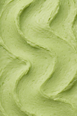 Fototapeta premium pistachio-сolored cream. Сreamy texture.Vertical photography. 9:16