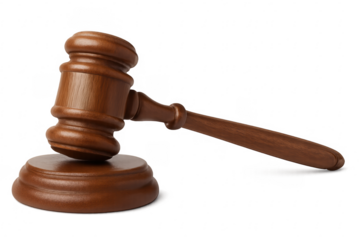 Wooden gavel resting on sound block with transparent background