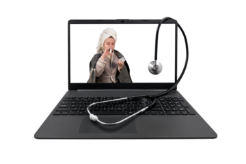 Laptop and medical stethoscope on a transparent background. On the laptop screen - a girl with cold symptoms injects a spray into her nose
