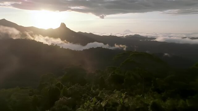 Mystical Sunrise Over Lush Mountains