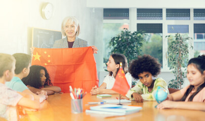 Kids learning together about china in geography class