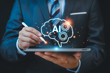 Artificial intelligence ai concept businessman using tablet with brain gears technology 4 ir innovation