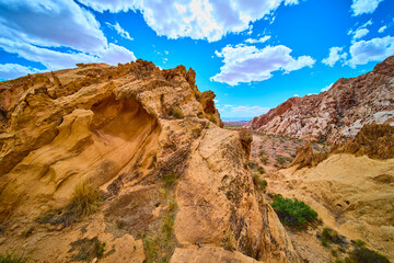 Sandstone Formations and Dramatic Desert Landscape Under Blue Sky
