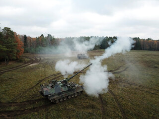 Aerial view showing extensive smoke screen coverage across training field