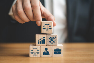 Naklejka premium Legal business strategy concept with wooden blocks and icons for law firm development