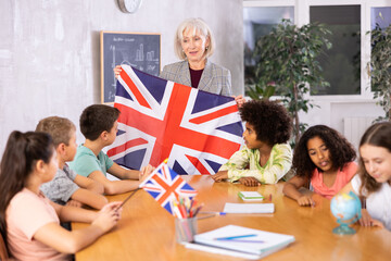 Kids learning together about united kingdom in geography class