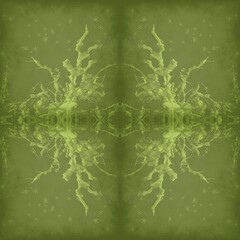 Abstract green tile symmetrical mosaic ornament pattern background. Seamless floral fabric paper. Kaleidoscope pattern texture art, geometric embroidery, stained glass floral wallpaper.