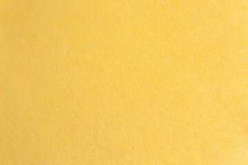 Soft yellow fabric texture close-up
