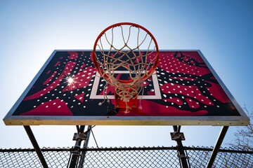 basketball hoop against blue sky