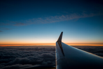 plane wing at sunset