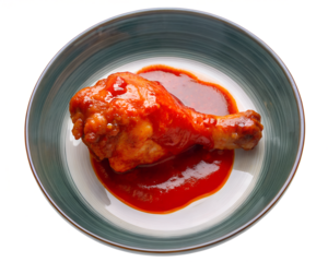 Pierna de pollo con salsa en él sabor