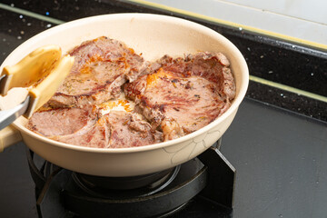 cooking beef at home at horizontal composition