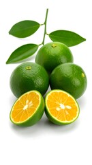 Fresh green kumquats, whole and sliced, with leaves