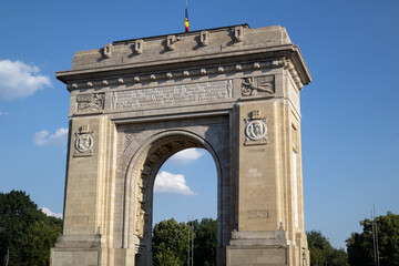 Fototapeta premium The Triumphal Arch in Bucharest, Romania. A magnificent and famous landmark, a historical monument commemorating the country's victory in World War I
