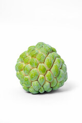 Green custard apple fruit isolated on white background, showing its natural scaly texture, symbol of exotic tropical taste, organic nutrition, sweetness, and healthy lifestyle.