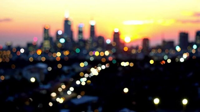 Cityscape view at sunset with bokeh effect and blurred buildings in the distance horizon glow