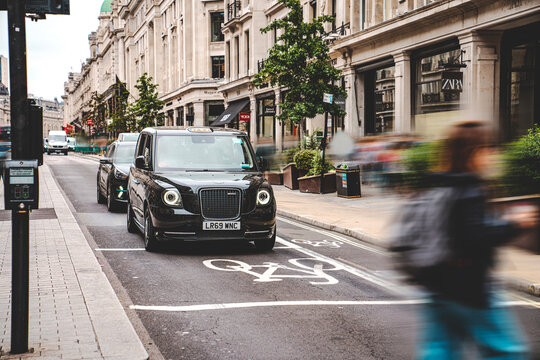 Classic British Black Taxi, English Black Cab, Hackney Carriage, Regent Street, London City Centre, UK - July 2025