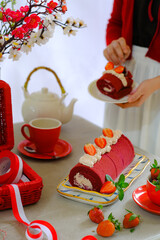 still life roll cake in red and white concept