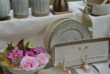 cups and plates in antique market