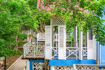 A charming wooden structure surrounded by lush greenery in Rosario Islands, Cartagena, Colombia,...