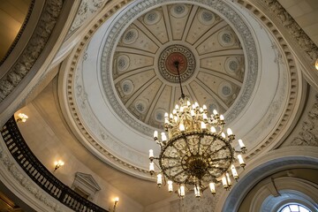 Stunning Worm's Eye View of an Ornate Circular Ceiling with a Grand Chandelier