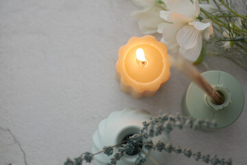  Candle Surrounded by Flowers and Aromatic Incense Sticks for Relaxation