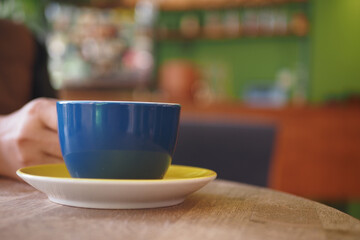 Enjoying coffee in a cozy cafe setting