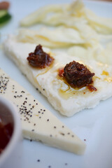 Traditional dish featuring cheese and savory toppings