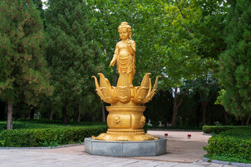 Genre sculpture at the foot of the Nanshan Great Jade Buddha Hall in the Nanshan Tourist scenic...