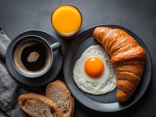 Breakfast croissant and coffee in morning 