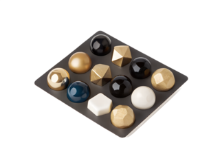 Assortment of Geometric Chocolate Candy on Tray on Transparent Background on white background