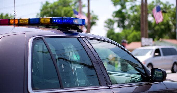 Policeman directing traffic in intersection 4k