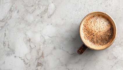 Top view of a cup of coffee on marble